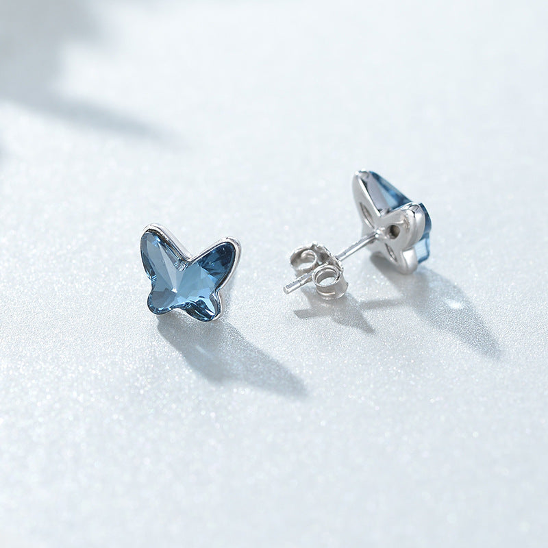 Collezione "Blue Whisper" con collana e orecchini con cristalli blu.