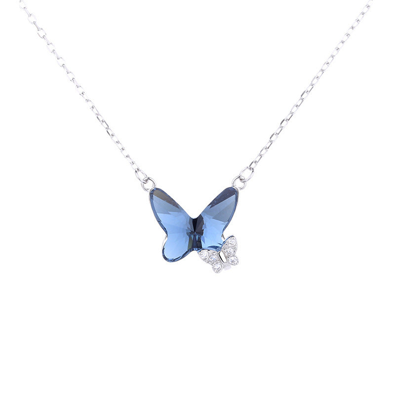 Collezione "Blue Whisper" con collana e orecchini con cristalli blu.